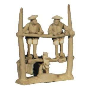  Two mudmen on water wheel   ceramic 3.5H