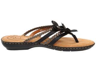   from clarks leather straps are accompanied by synthetic metallic