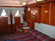 First Class accommodations on Queen Mary , converted into a present 