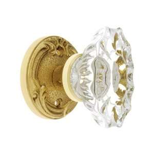   Oval Crystal Knobs Passage in Unlacquered Brass.