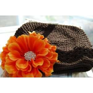   Clusters Center on Chocolate Beanie Hat. Fit Baby up to 4 Years. Baby