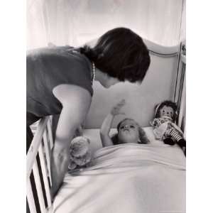  Jackie Kennedy Tucking Her Young Daughter Caroline Into 
