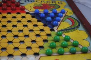 Vintage Chinese checkers game with marbles  