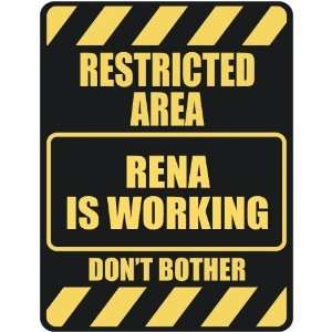   RESTRICTED AREA RENA IS WORKING  PARKING SIGN