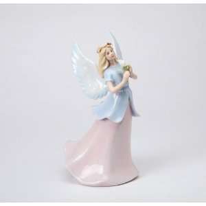  8.125 inch Angel In Blue Top And Pink Skirt Holding Lily 