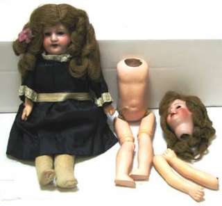 Offering a lot of antique bisque dolls and a celluloid doll. Included 
