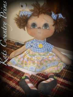   is a 14 raggedy ann style doll she is made from muslin and has