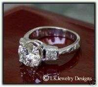 02 CT MOISSANITE ROUND & 4 BAGUETTES SOLITAIRE RING  
