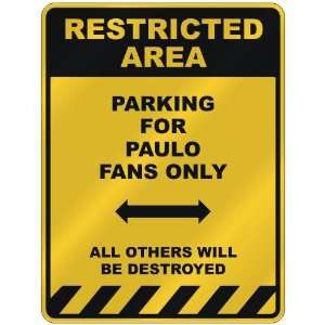  RESTRICTED AREA  PARKING FOR PAULO FANS ONLY  PARKING 