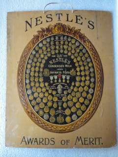 1900s Vintage Nestle Awards of Merit Emboss Paper Sign  