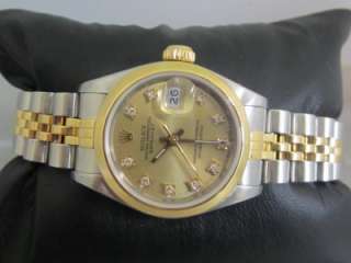 rolex dealer to confirm watch is in excellent preowned condition works 
