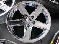 This is a clean used set of factory Chrome Clad 20 wheels removed from 