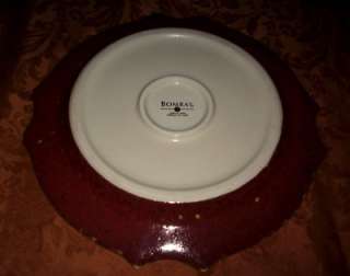 The auction is for (1) 11 1/2 dinner plate by Bombay Company in the 