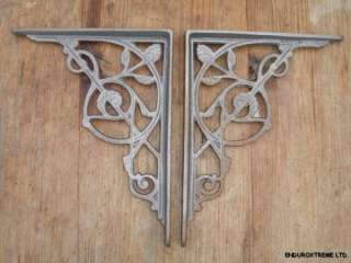 PAIR OF ARTS AND CRAFTS STYLE IRON SHELF BRACKETS.  