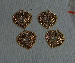 lot of 4 gold open heart charms  