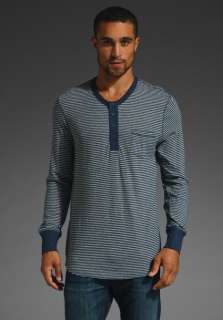 ALTERNATIVE APPAREL The Scout Long Sleeve Henley in Indigo Stripe at 