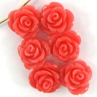 Reconstituted coral carved rose pendant with a hole drilled from top 