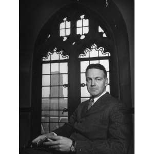  Robert Maynard Hutchins Sitting in Campus Building 