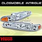 98 02 OLDSMOBILE INTRIGUE HEADLIGHTS HEADLAMPS PAIR NEW  