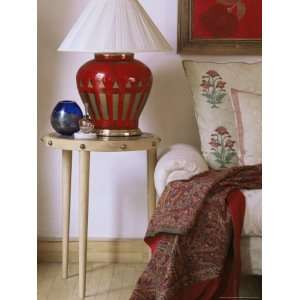 Side Table and Hand Blown Glass Based Lamp Beside Sofa in Drawing Room 